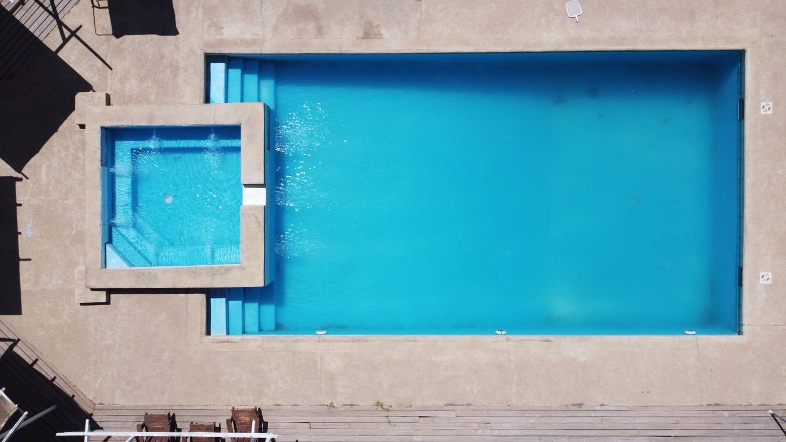Aerial view of the shared pool at Domos Ocoa