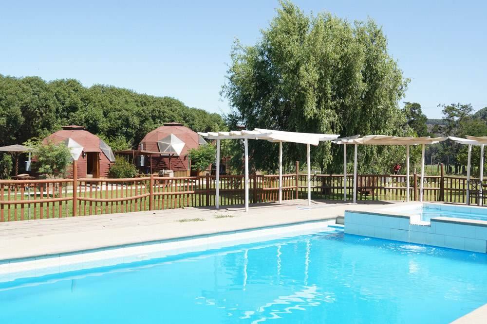 Shared pool at Domos Ocoa with pergolas